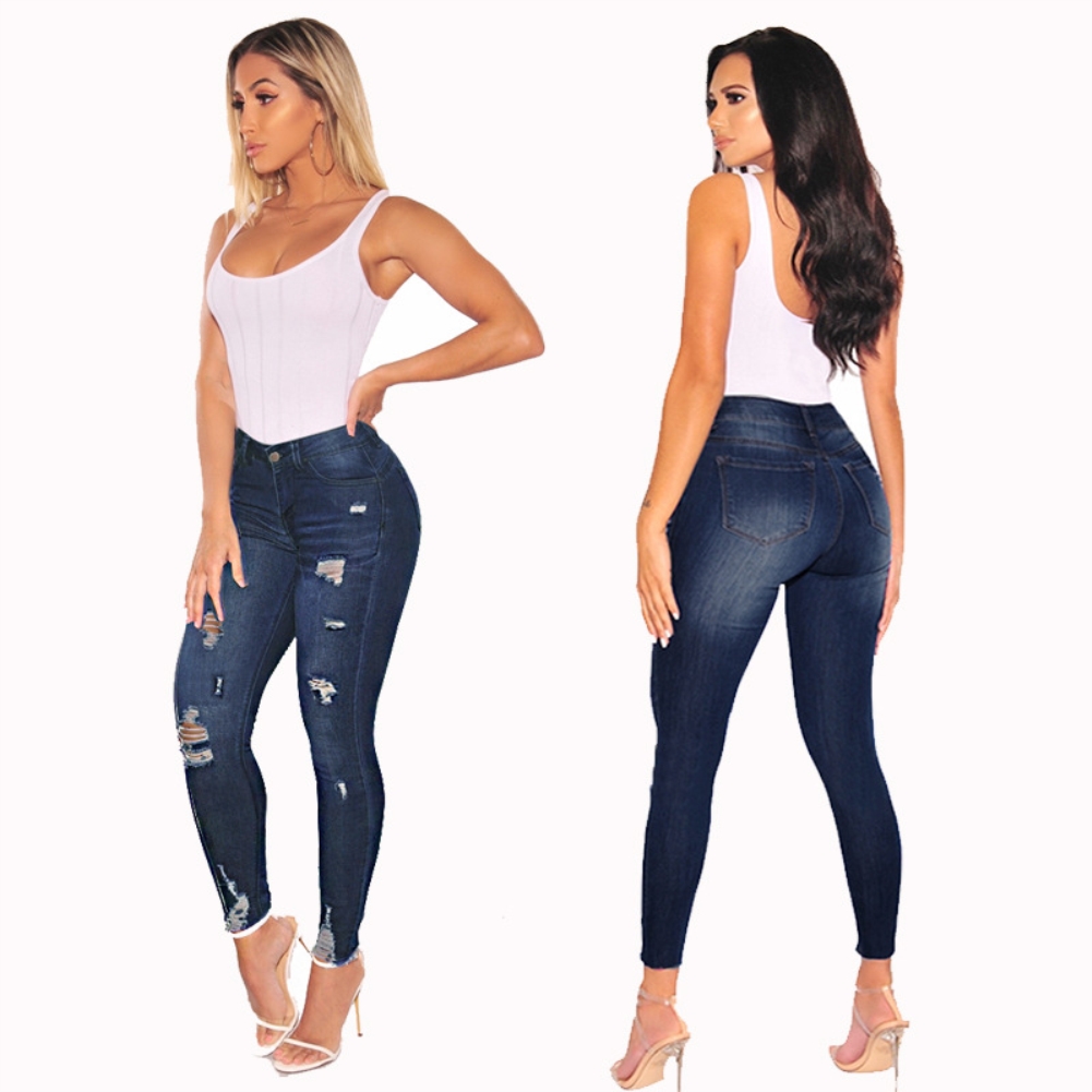 tight blue ripped jeans