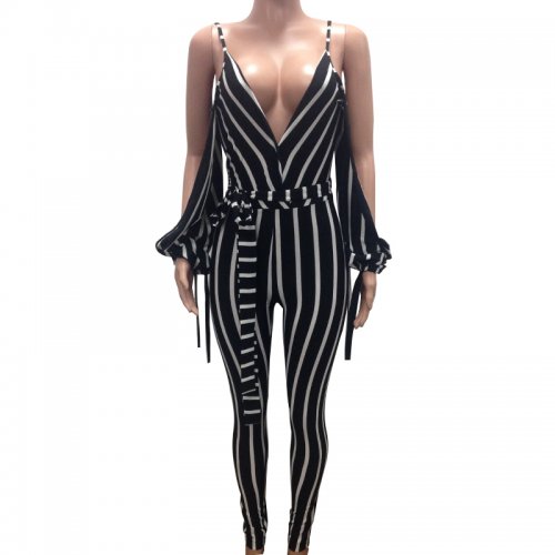 white low back jumpsuit