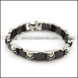 Black Ceramic Bracelet with Stainless Skulls b005607