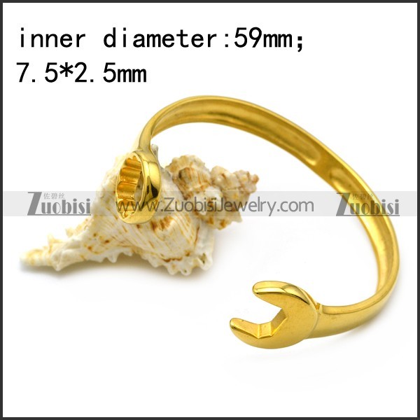 yellow gold plated stainless steel casting spanner bangle b007006
