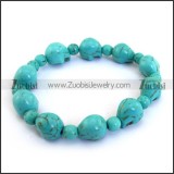 Turquoise Stone Skull Bracelet Joined with Elastic Cord b004086