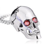 large smooth skull with 2 ruby zircon JP350051