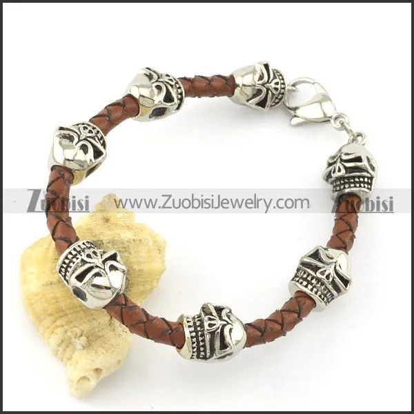 brown braided leather bracelets for men with 7 ugly skull heads b001799