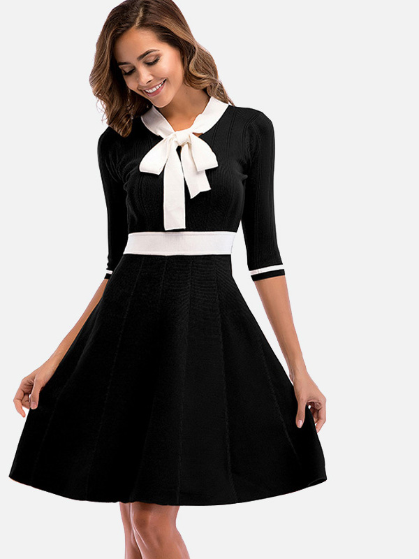 dress with bow tie at neck