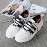 Spring and autumn leisure 2019 fashion women's shoes black white cross lacing flat gym shoes comfortable concise leather