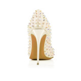 Arden Furtado summer 2019 fashion trend women's shoes pointed toe rivet pure color white serpentine pumps stilettos heels office lady slip-