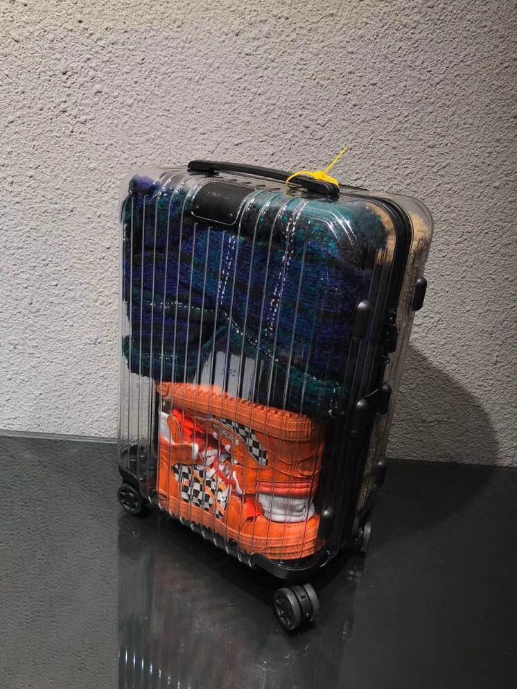 off white transparent suitcase