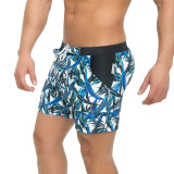 TAD Blue and Green Leafs on White Racing Performance Thirt Cut Swimwear